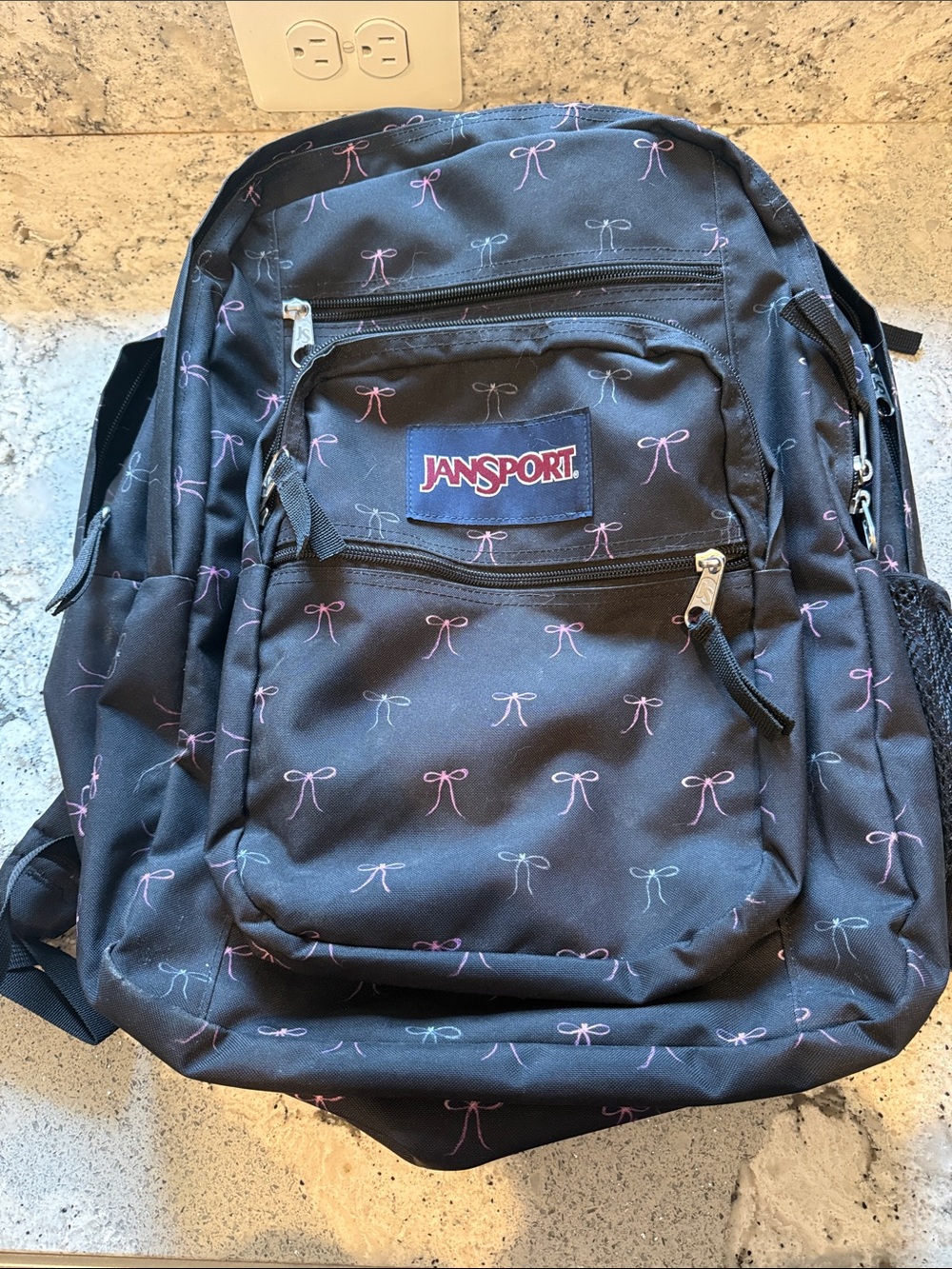 Jansport Black Backpack with Pink Bow Pattern